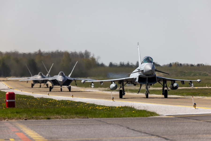 RAF Typhoon fighter jets from IX (B) Sqn have exercised with US Air Force F-22s in the skies over Estonia.