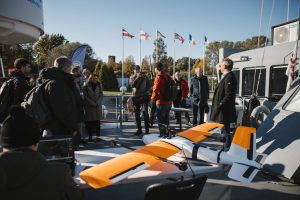 On October 17, 2024, in Riga, Latvia, the European Defence Fund project 5G COMPAD (5G Communications for Peacekeeping and Defence) held its first global demonstration, showcasing various 5G network deployment scenarios at sea, in the air, and on land. The demonstration was organized by 5G COMPAD consortium member LMT and took place at the military base "Daugavgrīva."