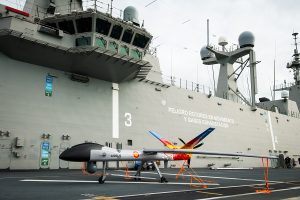 Airbus has announced an agreement with Spanish shipbuilder Navantia to explore upgrades to the operational capabilities of the Spanish Navy’s flagship vessel, the amphibious assault ship Juan Carlos I (L 61). The collaboration aims to integrate SIRTAP unmanned aerial systems (UAS) onto the ship, marking a significant step towards advancing its aviation and operational capabilities.