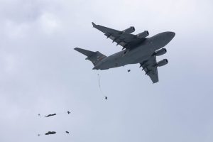 Paratroopers from the 82nd Airborne Division executed a Joint Forcible Entry (JFE) training jump from a C-17 Globemaster III in Norway on May 13, 2025, as part of Swift Response 25 during DEFENDER 25. This exercise showcased the Division's rapid deployment capabilities, operational readiness, and interoperability with NATO allies in a complex joint environment.
