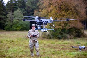 Soldiers from the 1st Battalion, 502nd Infantry Regiment, 2nd Mobile Brigade Combat Team, 101st Airborne Division (Air Assault), are trialling a new 3D-printed munition dropper named the Widowmaker during the Combined Resolve 26-1 exercise. The system is designed to improve responsiveness and flexibility in simulated combat scenarios.