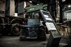 Diehl Defence is presenting its Unmanned Ground Vehicle Ziesel equipped with the PLATON autonomy kit at Enforce Tac in Nürnberg. Alongside systems for drone defence and ground-based air defence, the company is highlighting its focus on the battlefield of the future, where unmanned ground systems are expected to play an important strategic role.