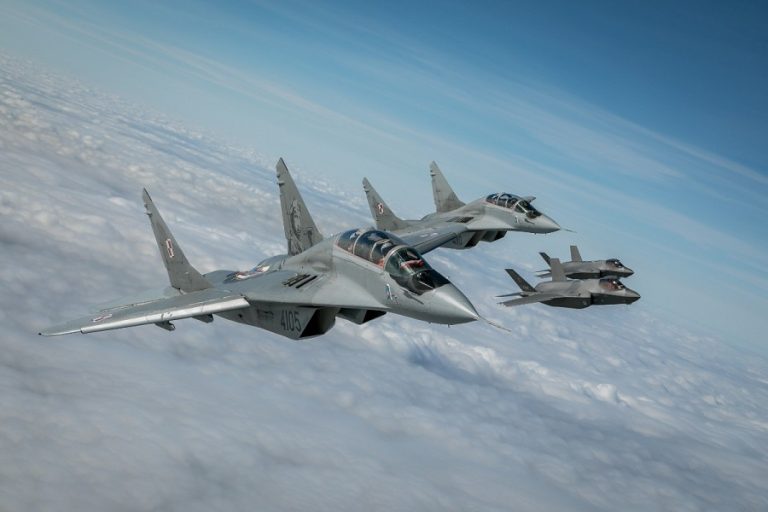 NATO fighter jets conducted combined air policing drills simulating aircraft intercepts and conducting approach