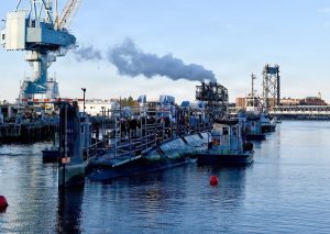 Portsmouth Naval Shipyard has completed inspection, testing and installation of the first welded additive manufactured flange aboard the USS Washington, marking a milestone for submarine maintenance. The component, installed on March 18 following testing on March 9, represents one of the first uses of such technology on an in-service submarine.