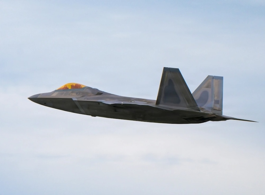 F-35C Lightning II and F-22 Raptor fighters demonstrate air dominance against simulated peer threats and complex air defenses at Red Flag-Alaska