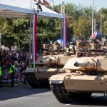 U.S. Army Abrams tanks took part in Poland’s Armed Forces Day parade in Warsaw on August 15, demonstrating the readiness of American and allied forces deployed on NATO’s eastern flank. The vehicles appeared with the NATO Forward Land Forces Battle Group-Poland, part of V Corps’ ready forces in Europe.