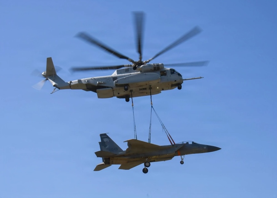 U.S. Marine Corps CH-53K helicopter lifts F-15 fighter jet in multinational crash recovery exercise in Wisconsin