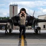 The F-35 program is entering a new phase of global expansion, with record deliveries, growing international demand and a weapons roadmap that extends deep into the next decade. The growth is colliding with mounting modernization costs, supply-chain disruption and persistent shortages of spare parts and depot capacity.