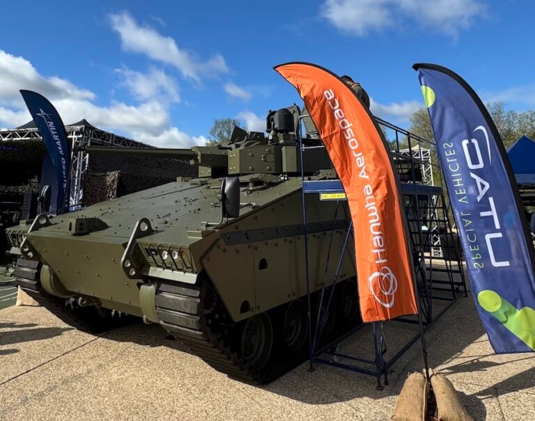 Hanwha Aerospace and Lockheed Martin UK have integrated a British-built 40mm turret and counter-uncrewed aircraft capability onto the Redback infantry fighting vehicle. The companies presented the configuration at Defence Vehicle Dynamics 2026 in Millbrook, Bedfordshire, as an offering for NATO customers.
