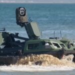 Rheinmetall is testing a networked maritime security architecture that combines unmanned platforms, underwater sensors and a mobile command centre at REPMUS26 in Portugal. The system is supporting German Navy port-security activities while assessing how equipment from different suppliers can operate through a common interface.