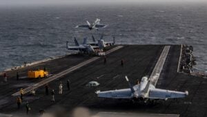 USS Abraham Lincoln returns to Indo-Pacific after seven-month Middle East deployment, making logistics stop in Guam