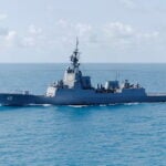 HMAS Sydney has returned to Fleet Base East after 131 days in the Indo-Pacific, completing a deployment that included live missile firings, allied exercises and South China Sea operations. The Hobart-class guided-missile destroyer trained in integrated air and missile defence and maritime warfare with forces from across the region.