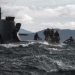 British commandos have landed from a German attack submarine at Cape Wrath and called in fire from a Portuguese warship, in an operation that formed part of the largest test of all arms of the UK Commando Force in 15 years. The Royal Navy said the landing took place during Exercise Strike Warrior, a commando-led exercise under way across Scotland.