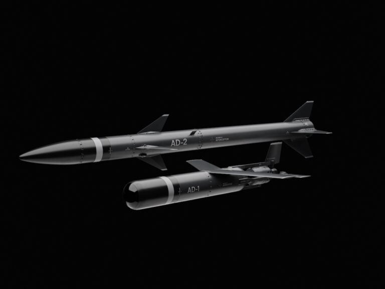 Helsing has unveiled Contra, an AI-controlled air defence system designed to counter large-scale drone and missile attacks. The German company is also developing two container-launched interceptors, AD-1 Inferno and AD-2 Ambush, intended to engage fast drones and cruise missiles at lower cost than existing interceptors.