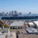 USS Abraham Lincoln returned to San Diego with target markings that differ from the destruction totals reported by War Secretary Pete Hegseth. Painted on the carrier’s island, the symbols record drone and naval targets destroyed during the Lincoln Carrier Strike Group’s six months of operations against Iran.